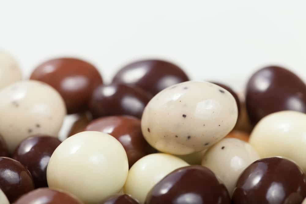 A macro shot of a variety chocolate covered espresso beans. Shallow DOF.