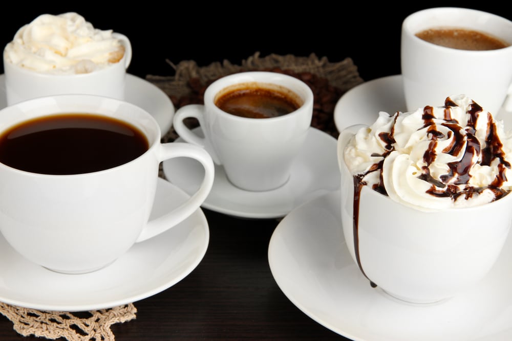 Assortment of different hot coffee drinks close up